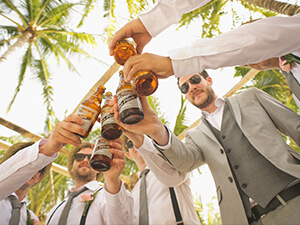 guys toasting with beers